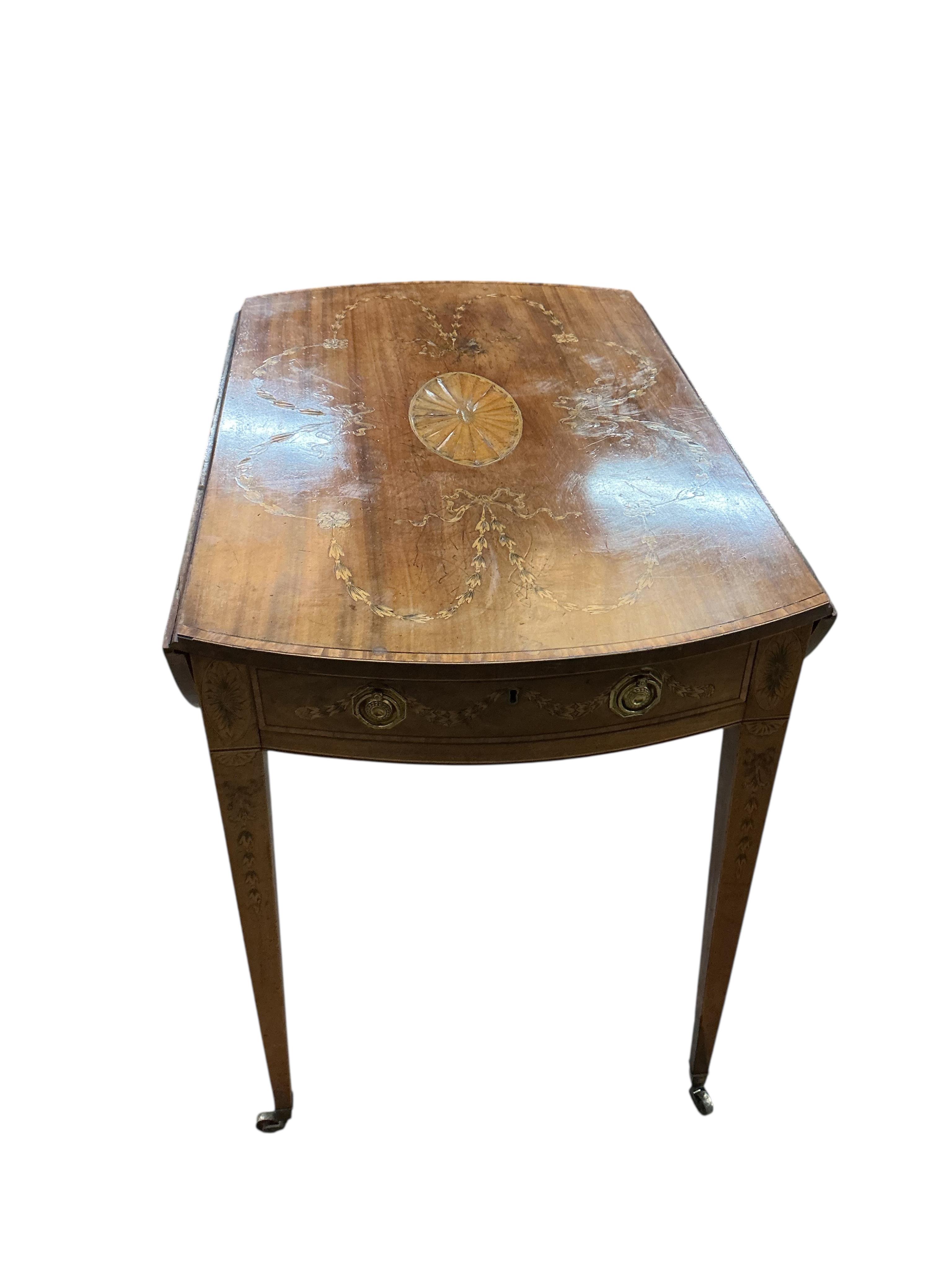 A George III oval mahogany and later marquetry inlaid Pembroke table, width 52cm, depth 81cm, height 72cm